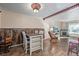 Open concept dining area with wood flooring and built-in seating at 381 El Paso Ct, Denver, CO 80221