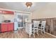 Bright dining area featuring a sliding glass door and stylish decor at 381 El Paso Ct, Denver, CO 80221