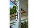 Close-up of the house number '3047' displayed in modern, black numerals attached to a white pillar at 3047 N Milwaukee St, Denver, CO 80205