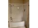 This bathroom features a bathtub and shower at 9557 W San Juan Cir # 207, Littleton, CO 80128