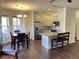Bright eat-in kitchen with stainless steel appliances and updated cabinetry at 9557 W San Juan Cir # 207, Littleton, CO 80128