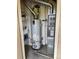 Utility closet with water heater and furnace and added shelving at 9557 W San Juan Cir # 207, Littleton, CO 80128