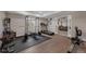 Home gym with rubber mat flooring and a variety of equipment for a complete workout at 17124 Mariposa St, Broomfield, CO 80023
