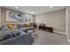 The living room featuring comfortable seating, modern decor and lots of space for entertaining and relaxing at 17124 Mariposa St, Broomfield, CO 80023