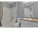 Clean bathroom with shower/tub combo, vanity, and toilet at 12926 Ironstone Way # 201, Parker, CO 80134