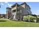 Side view of apartment building showcasing landscaping at 12926 Ironstone Way # 201, Parker, CO 80134