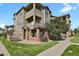 Attractive 3-story apartment building with brick and siding at 12926 Ironstone Way # 201, Parker, CO 80134