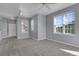 Bright living room with neutral walls and carpet at 12926 Ironstone Way # 201, Parker, CO 80134