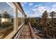 Deck with mountain views and wooden railings at 22598 Westview Ave, Golden, CO 80401