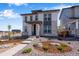 Beautiful two-story home featuring a stone entryway and tastefully landscaped front yard at 24801 E 33Rd Dr, Aurora, CO 80019