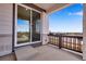 Covered patio featuring a sliding glass door, offering great view at 24801 E 33Rd Dr, Aurora, CO 80019