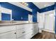 Bathroom with double vanity and walk-in shower at 24263 E 41St Ave, Aurora, CO 80019