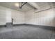 Finished garage with epoxy flooring and ample storage at 24263 E 41St Ave, Aurora, CO 80019