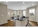 Modern kitchen with island and breakfast bar at 24263 E 41St Ave, Aurora, CO 80019