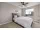 This bedroom includes an oversized window for natural light and great views of the outdoors at 10305 Martin Luther King Blvd, Denver, CO 80238
