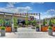 Exterior shot of the community entrance featuring landscaping and manicured greenery at 10305 Martin Luther King Blvd, Denver, CO 80238