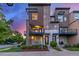 Charming three-story townhouse featuring a private balcony and modern design at 10305 Martin Luther King Blvd, Denver, CO 80238
