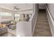 The living room and kitchen flow together seamlessly in an open-concept design at 10305 Martin Luther King Blvd, Denver, CO 80238