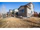 Charming backyard featuring a hammock and manicured landscaping at 162 Starlight Cir, Erie, CO 80516