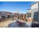 Backyard with a dining area on a deck, perfect for outdoor gatherings and enjoying the pleasant weather at 162 Starlight Cir, Erie, CO 80516