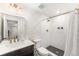 Modern bathroom featuring a sleek vanity, stylish shower, and contemporary design at 162 Starlight Cir, Erie, CO 80516