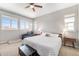Inviting bedroom with great natural light, neutral tones, and comfortable seating area at 162 Starlight Cir, Erie, CO 80516
