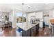 Bright kitchen featuring granite countertops, stainless steel appliances, and ample cabinet space at 162 Starlight Cir, Erie, CO 80516