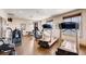 Well-equipped fitness center with treadmills and weight machines for residents' use at 7930 Larkspur Cir, Frederick, CO 80530