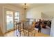 Breakfast nook with table, bar stool seating and natural light at 8561 E Grand Ave, Denver, CO 80237