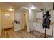 Laundry room with a washer, dryer, utility sink and storage cabinets at 8561 E Grand Ave, Denver, CO 80237