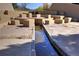 An outdoor water feature provides a natural space to relax, meditate, and enjoy the landscape at 8561 E Grand Ave, Denver, CO 80237