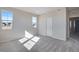 Bedroom featuring plush carpeting, neutral walls, and well-lit by natural light at 16798 W 94Th Way, Arvada, CO 80007