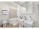 Modern bathroom with a floating vanity, glass-enclosed shower, and contemporary fixtures at 715 W 7Th Ave, Denver, CO 80204