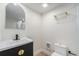 This is a small bathroom with a vanity and standing shower at 715 W 7Th Ave, Denver, CO 80204