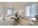 Bright living room with hardwood floors, fireplace, and stylish furnishings at 715 W 7Th Ave, Denver, CO 80204