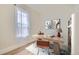 Bright home office with desk, chair, and large window at 715 W 7Th Ave, Denver, CO 80204