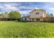 Expansive backyard featuring a grassy area at 3194 W 9Th Avenue Pl, Broomfield, CO 80020
