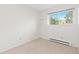 Serene bedroom with ample natural light from the large window at 3194 W 9Th Avenue Pl, Broomfield, CO 80020
