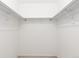 Well-organized walk-in closet with multiple hanging rods for storage at 3194 W 9Th Avenue Pl, Broomfield, CO 80020