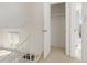 Upstairs hallway leading to bedroom and storage space at 3194 W 9Th Avenue Pl, Broomfield, CO 80020