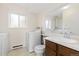 Functional laundry room featuring a washer, dryer, and ample counter space at 3194 W 9Th Avenue Pl, Broomfield, CO 80020