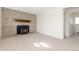 Cozy living room showcasing a brick fireplace and neutral carpet at 3194 W 9Th Avenue Pl, Broomfield, CO 80020