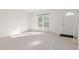 Sunny living room features a large picture window and a white front door at 3194 W 9Th Avenue Pl, Broomfield, CO 80020