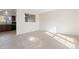 Bright living room features a pass through to the kitchen with ceiling fan at 3194 W 9Th Avenue Pl, Broomfield, CO 80020