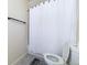 Simple bathroom with shower/tub and white toilet at 974 S Zeno Way, Aurora, CO 80017