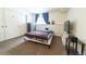 Basement bedroom with double bed and TV stand at 974 S Zeno Way, Aurora, CO 80017