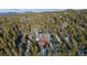 Beautiful home nestled among evergreen trees, providing a private mountain retreat at 439 Ronnie Rd, Golden, CO 80403