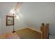 Cozy attic space with natural light from a window and a classic wood frame at 439 Ronnie Rd, Golden, CO 80403