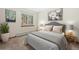 Bedroom with neutral-toned walls, a large window with wooded views, and carpeted floor at 439 Ronnie Rd, Golden, CO 80403