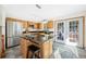 Modern kitchen featuring stainless steel appliances, granite countertops, and a center island with bar seating at 439 Ronnie Rd, Golden, CO 80403